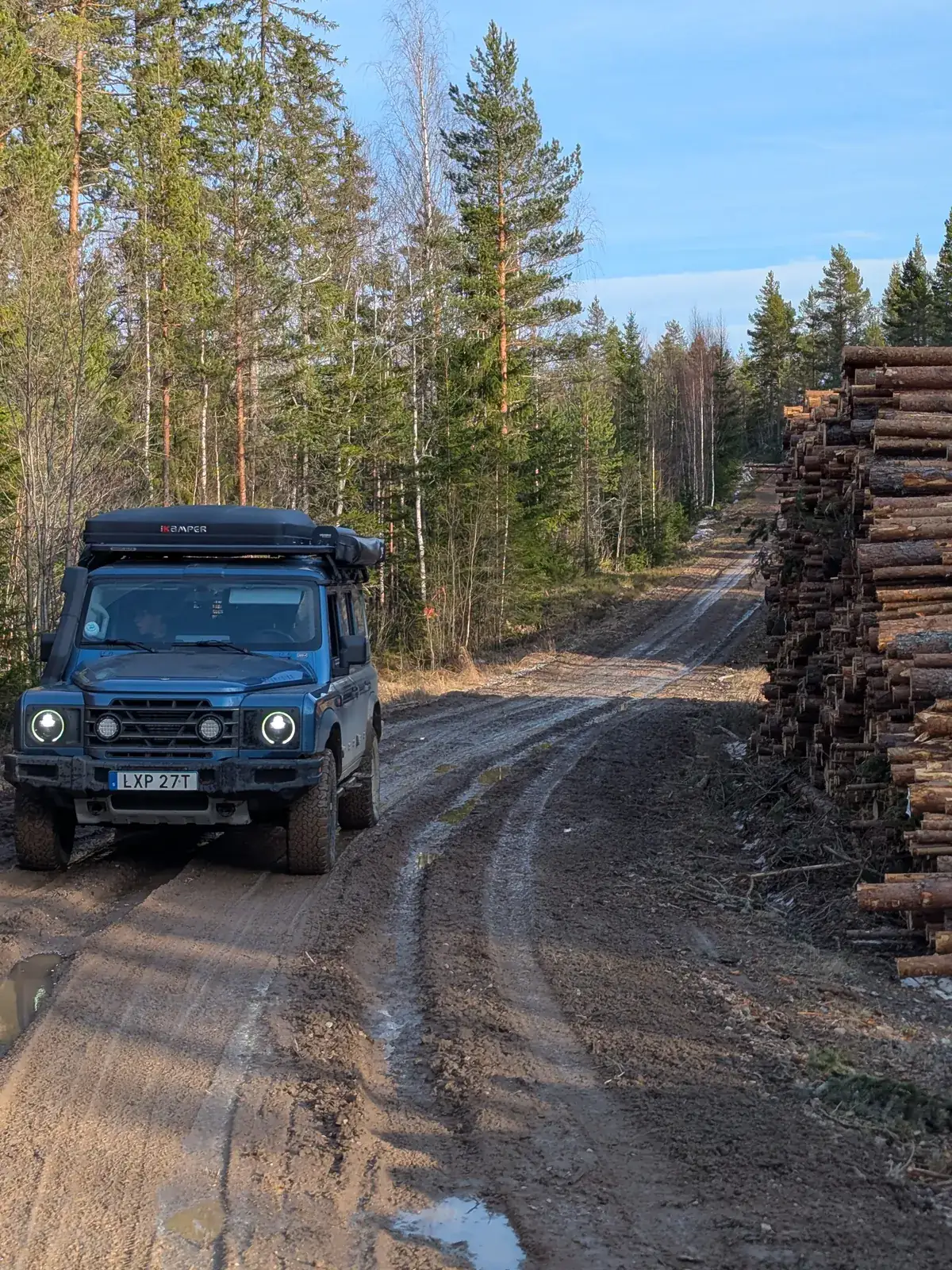 Ineos Grenadier on a forest track