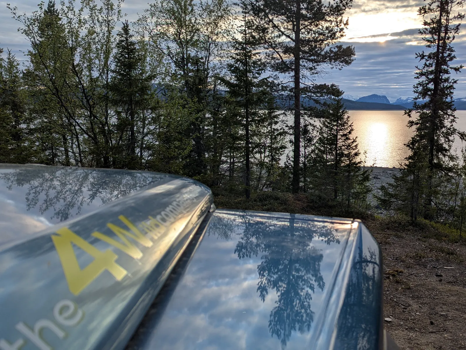 View over a mountain lake from the bonnet of our 4×4