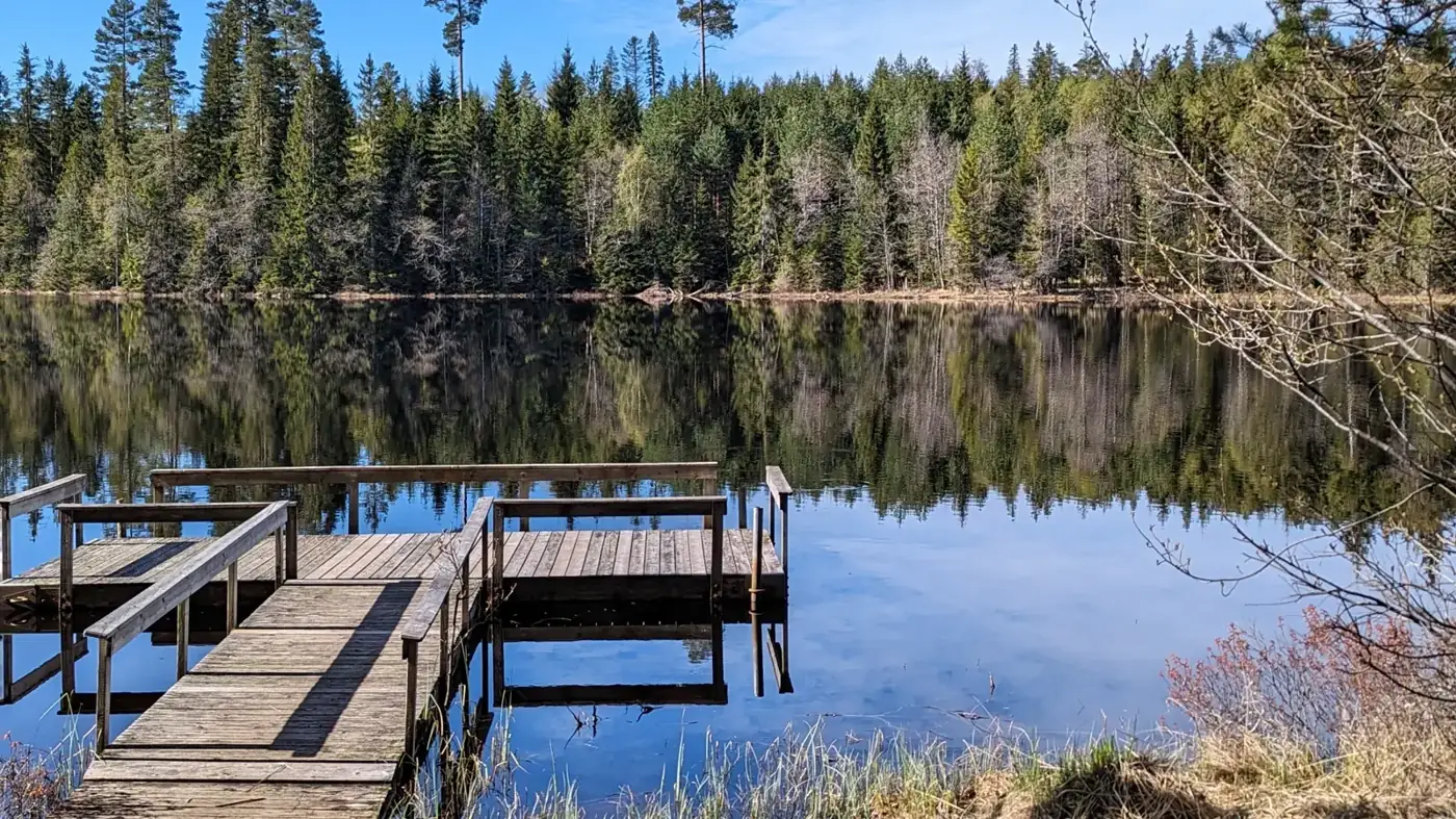 Wooden jetty on a quiet lake