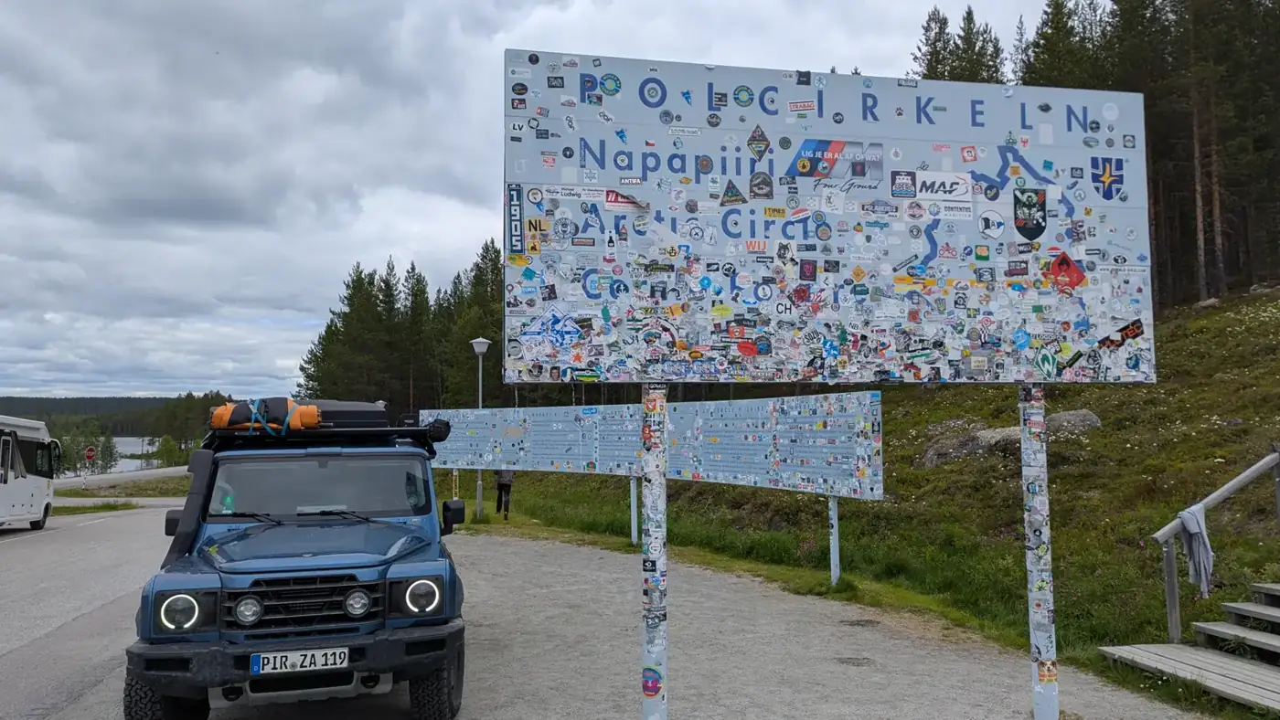 Our Grenadier at the Arctic Circle sign near Jokkmokk