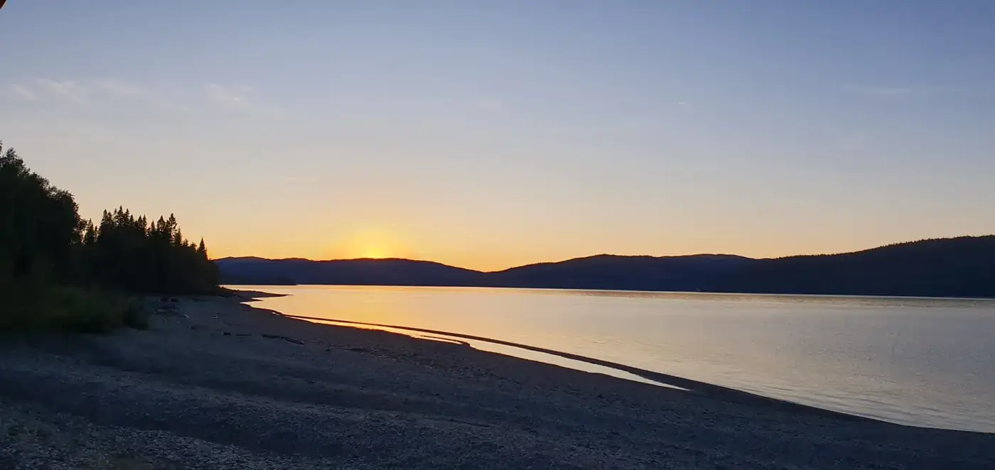 Sunset over a lake beach
