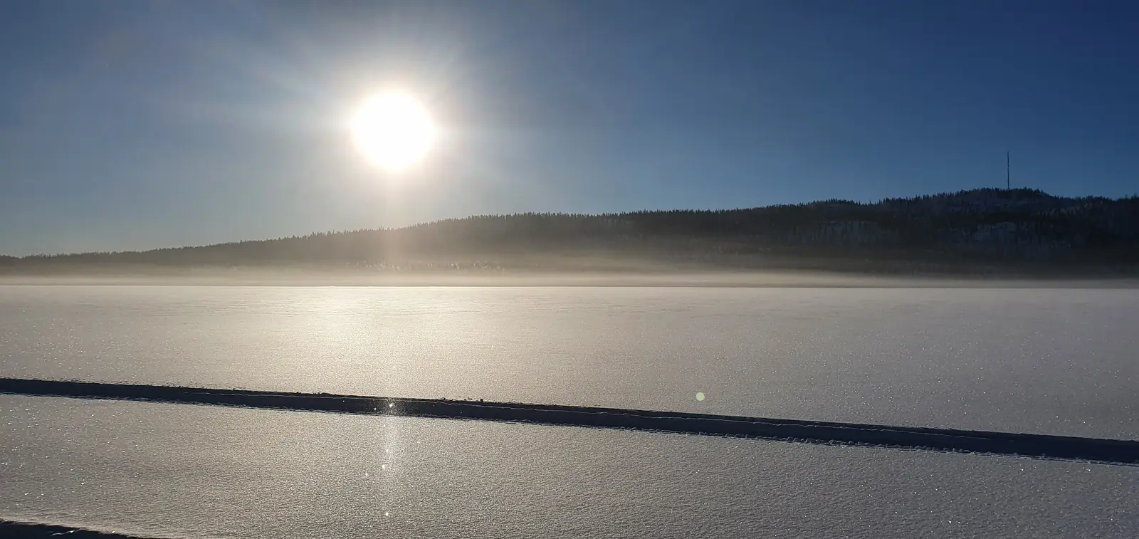Low sun over a frozen lake